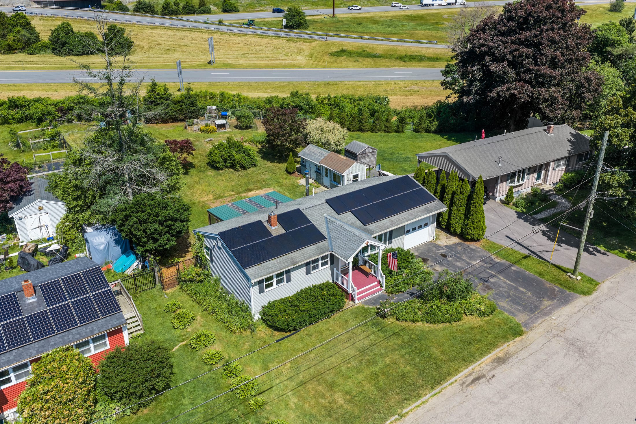 Aerial view of 46 Coakley Road showing the rooftop solar panels and lot