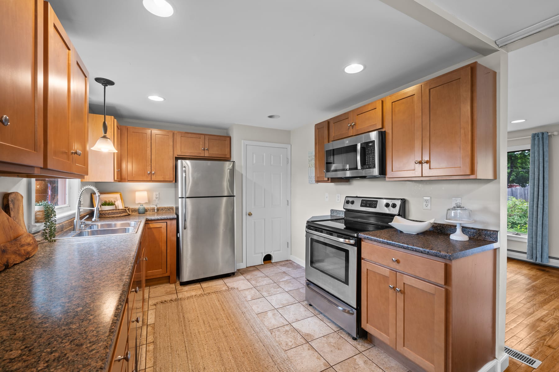 Maple kitchen with stainless appliances at 46 Coakley Road